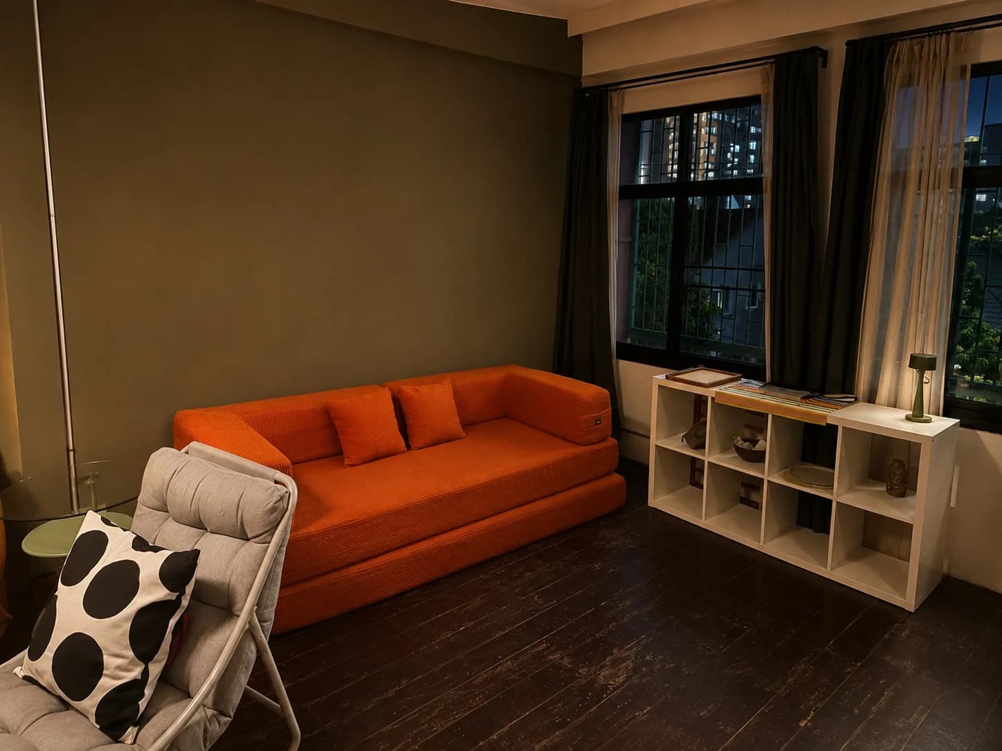 Creative Loft orange sofa and upstairs lounge